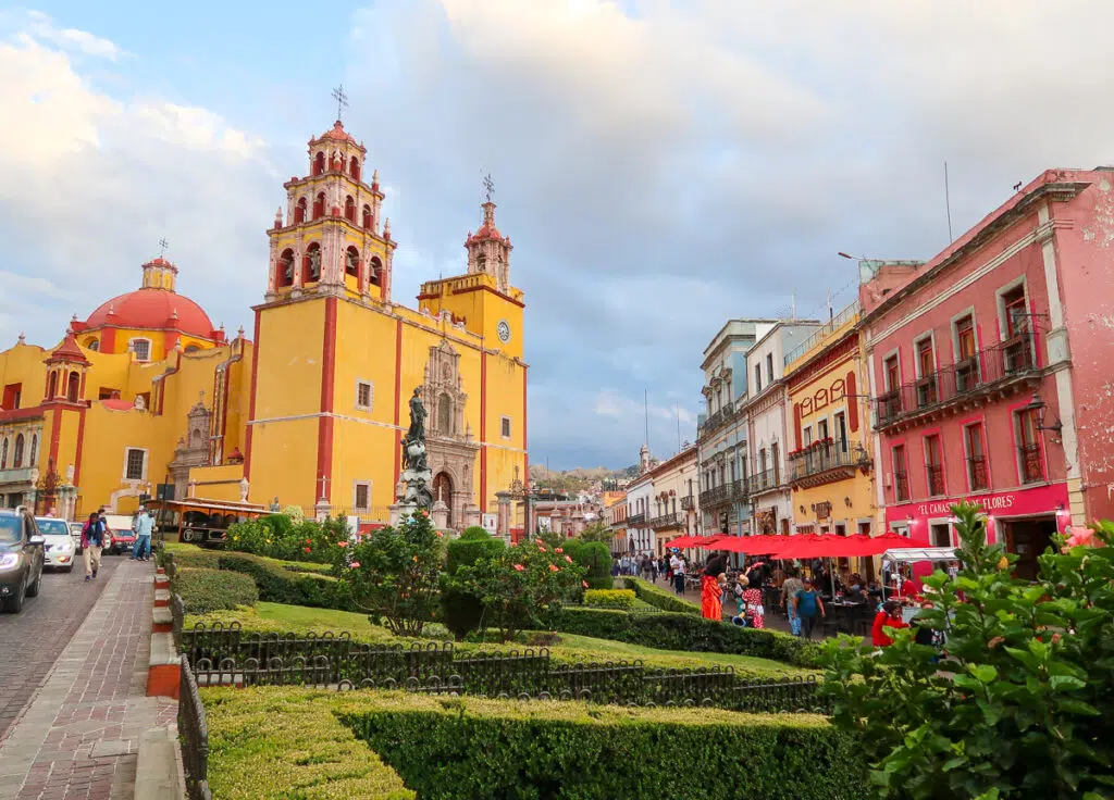 Beautiful cathedral and colorful buildings at Plaza de la Paz in Guanajuato
