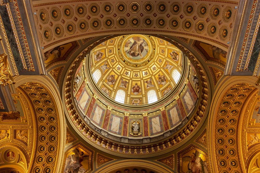 Beautiful, golden interior of St. Stephen's Basilica, a must-add in your Budapest itinerary