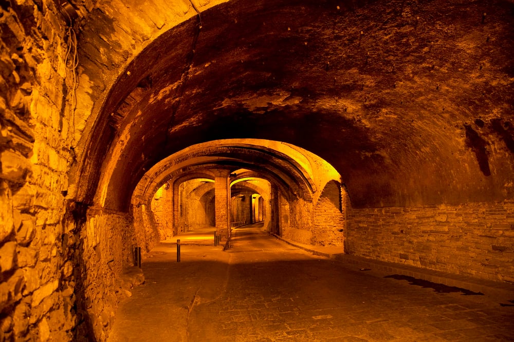 Underground tunnels lit up by lightbulbs in Guanajuato. Exploring the tunnels is one of the best things to do in Guanajuato, Mexico!