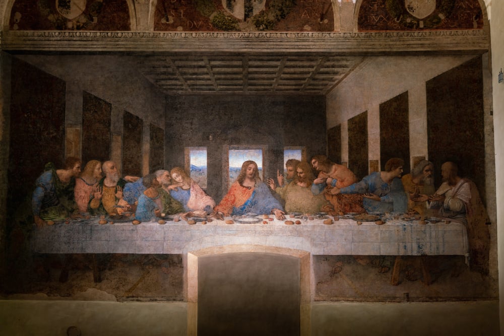 Monumental painting by Leonardo da Vinci depicting the scene of The Last Supper in the monastery of Santa Maria delle Grazie