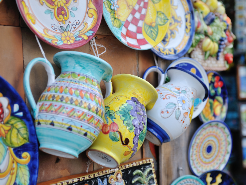 Colorful ceramics pottery and plates displayed in a shop in Vietri sul Mare, the cradle of the pottery famous around the world