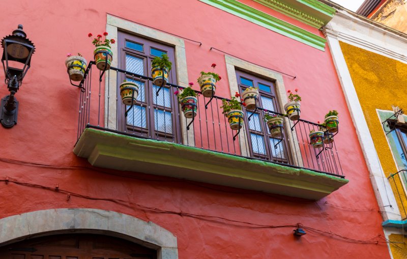 A beautiful balcony with flower pots in Guanajuato