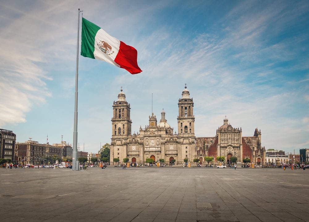 The Zocalo in Mexico city with a flag waving in the breeze