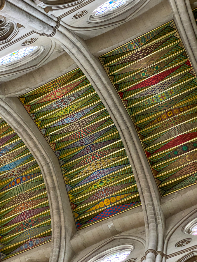 The colorful painted ceiling of Almudena Cathedral in Madrid