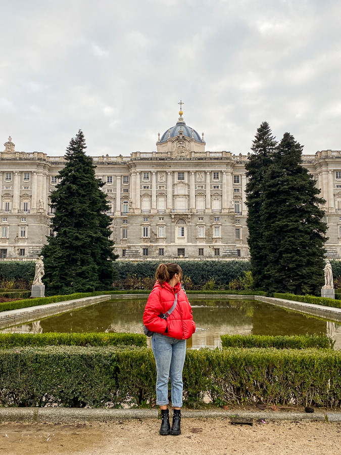 Standing by an elegant rectangular artificial pond in front of the Royal Palace of Madrid. The Sabatini Gardens is a must-see when you visit Madrid in one day.