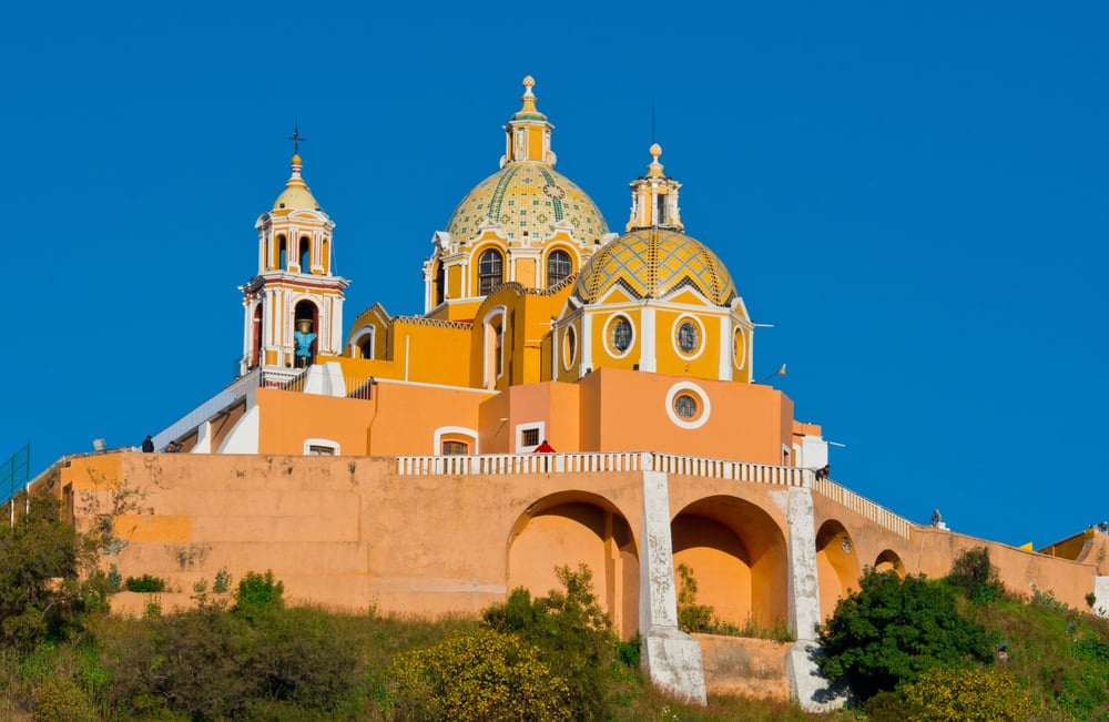 Iglesia de Nuestra Señora de los Remedios church with a blue sky