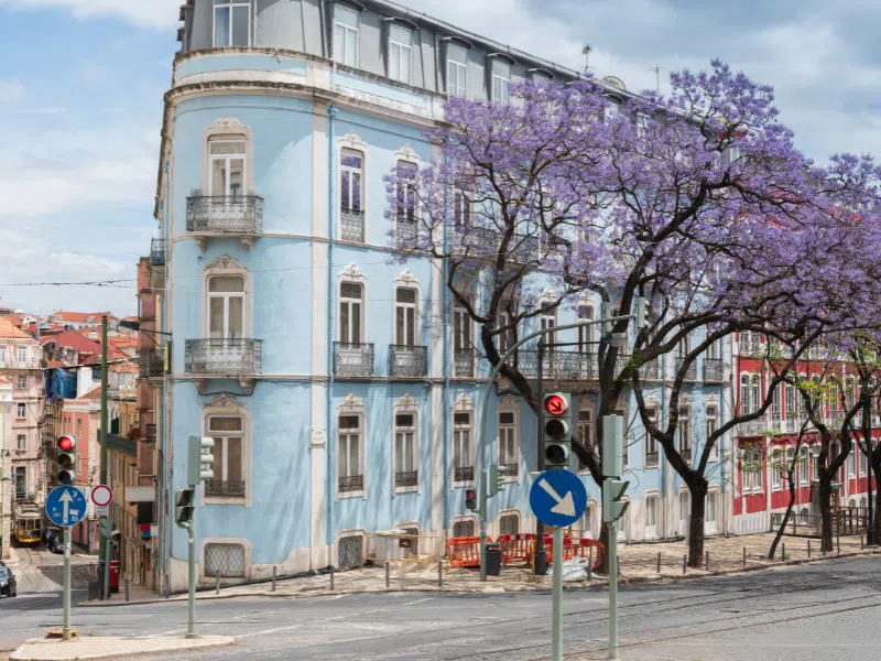 A colorful street corner in Lisbon -  in this 3-Day Lisbon Itinerary, you will explore the city a lot on foot to take in the beautiful and historic sights