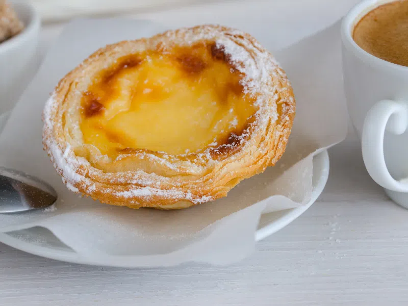 Pastel de Nata in Belem - a must-eat during 3 days in Lisbon. This Lisbon Itinerary includes all of the best things to do, see, and eat!