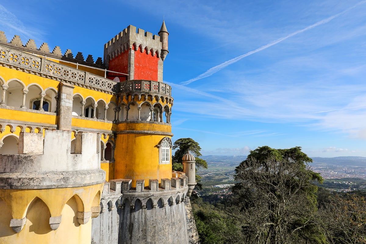 Colorful architecture of Pena Palace under a sunny sky