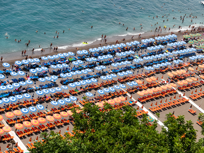 Colorful umbrellas on the main beach in Positano