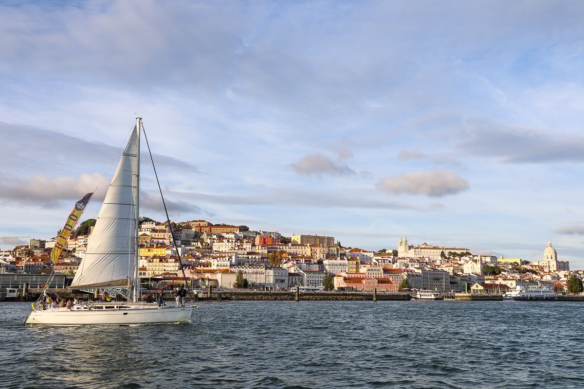 Sailboat along the Tagus River at sunset