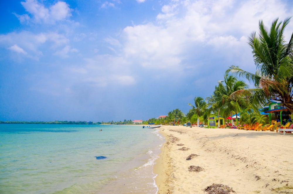 Quiet white-sand beach in Placencia, a must-add to your Belize itinerary