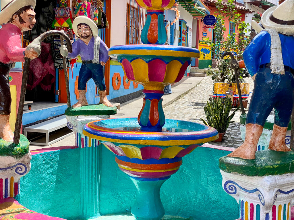 Colorful ceramic fountain in the middle of a street in Guatape