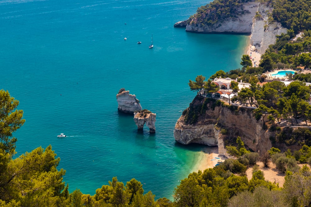 A beautiful view of a beach a cliffs in the Gargano National Park of Puglia