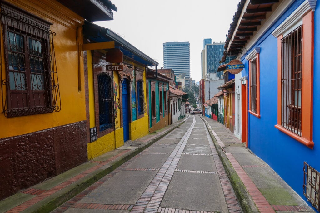 Quiet, colorful street in La Candelaria. Exploring the old town on a walking tour is one of the best things to do in Bogota (Colombia).