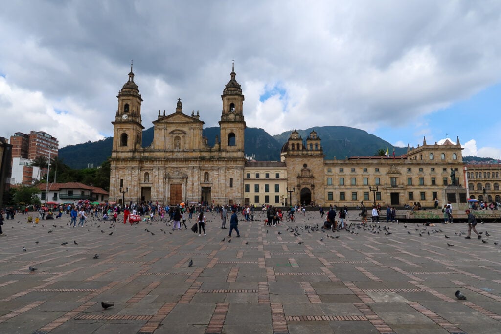 People roaming around Plaza de Bolivar - a must-see attraction in La Candelaria, Bogota