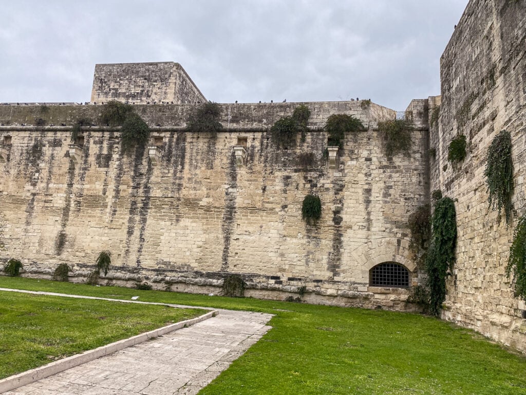 Walls of the stone castle in Lecce - one of the most beautiful cities in Puglia