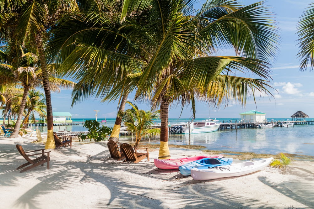 Kayaks on the shore in Caye Caulker - kayaking is one of the best things to do in Caye Caulker