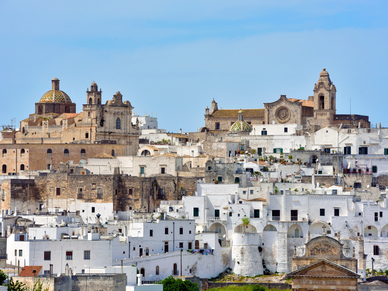 White buildings of Ostuni. Witnessing this picturesque, whitewashed town is a reason why you must visit Puglia.