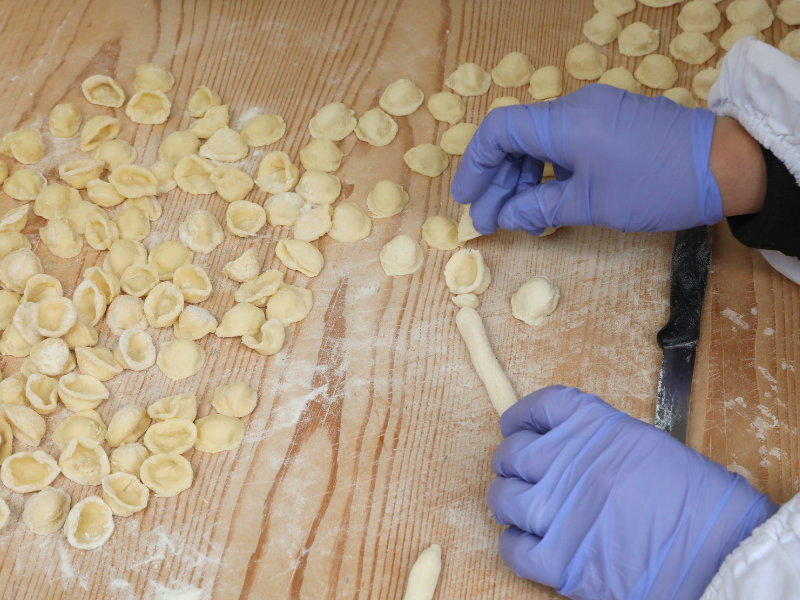 Preparing orecchiette pasta - one of the best things to do in the White City especially for foodies