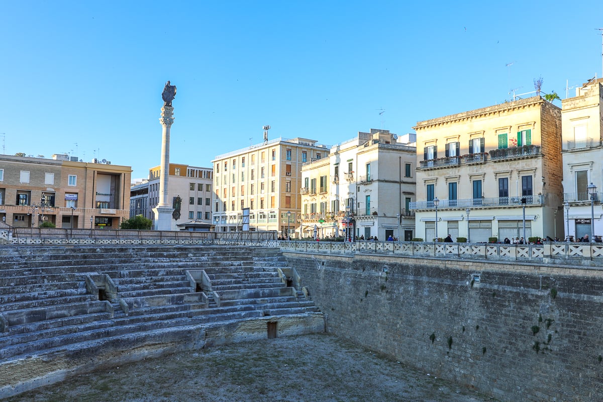 Ancient ruins at the Roman Amphitheater in Lecce - one of the reasons why everyone wants to visit Puglia, Italy