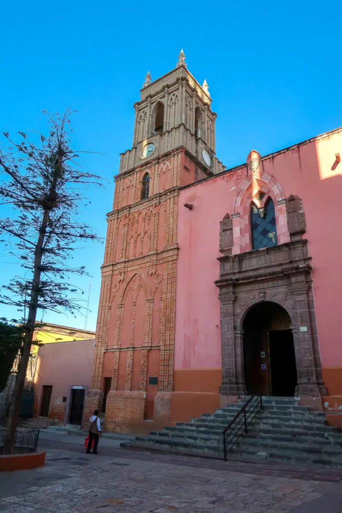 Clock tower of Parroquia de San Miguel Arcángel. Visiting this historical clock tower is one of the best things to do in San Miguel de Allende.