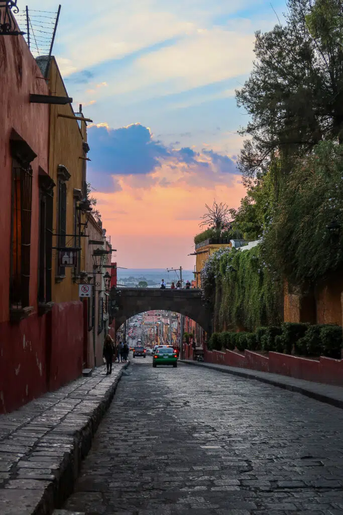 Cobblestone street in San Miguel de Allende at sunset