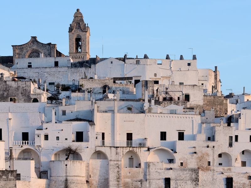 White-painted buildings of Ostuni under the blue sky