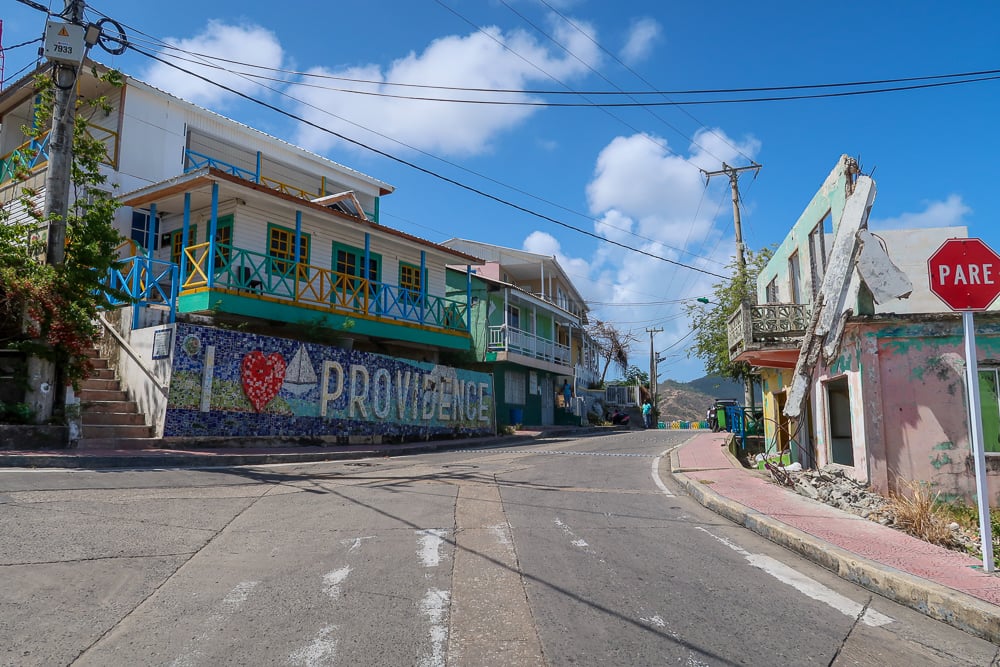 Quiet road in Providencia with street art that says "I Love Providence"