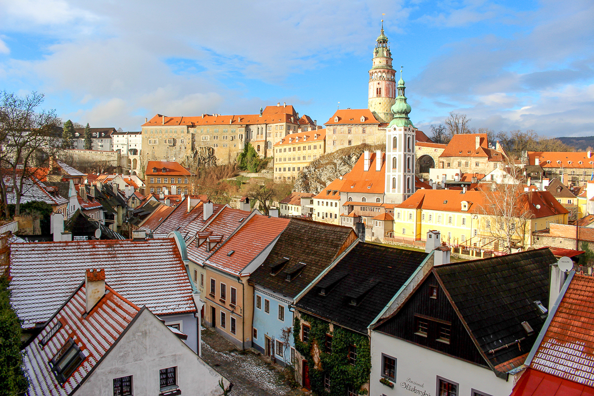 House rooftops and the medieval castle as seen from afar during our day trip to Český Krumlov 