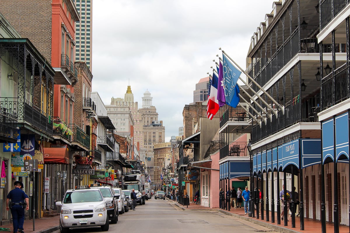 People walking down Bourbon Street in New Orleans