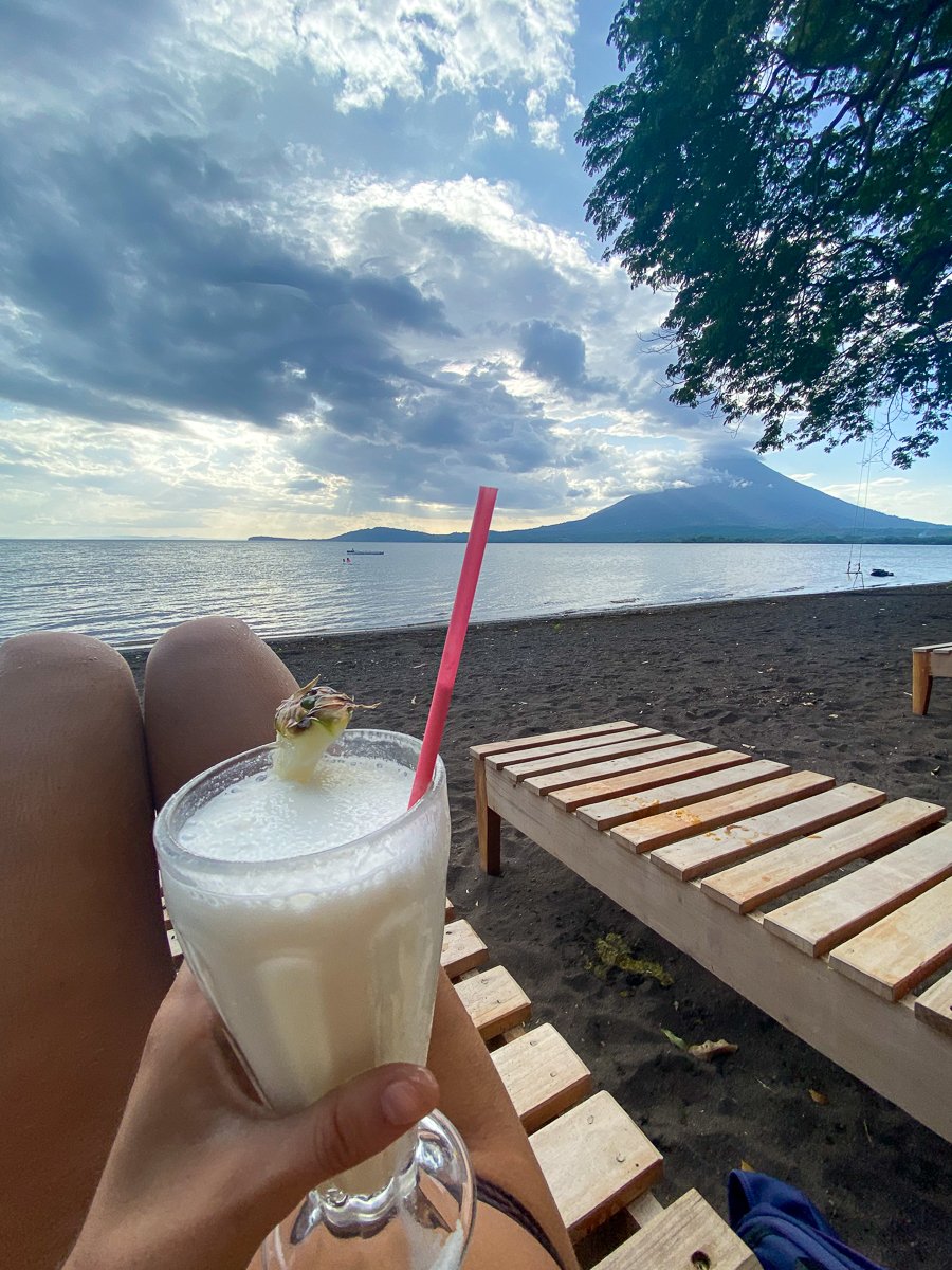 Enjoying a cold drink by the beach