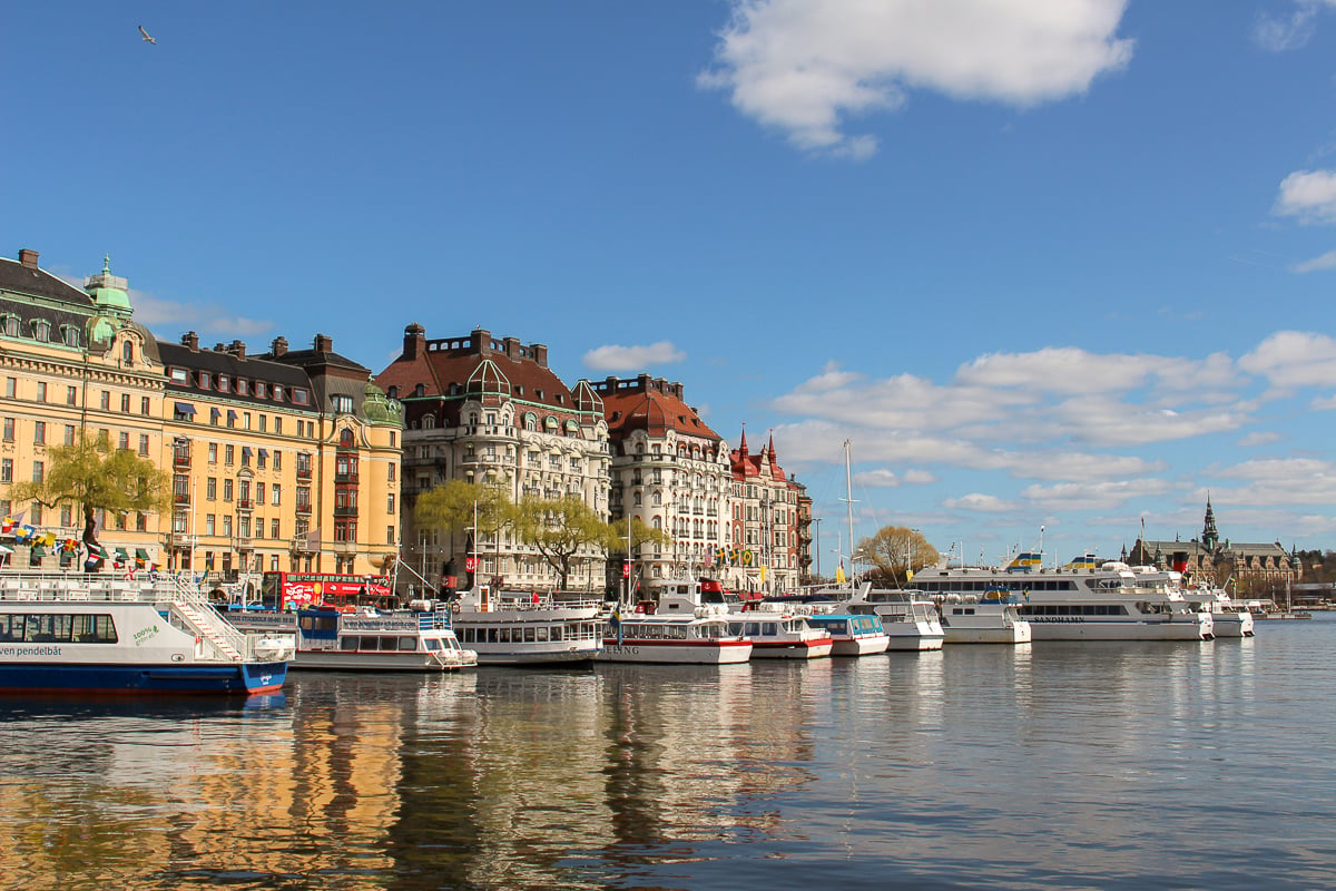 Waterfront in Stockholm lined with boats