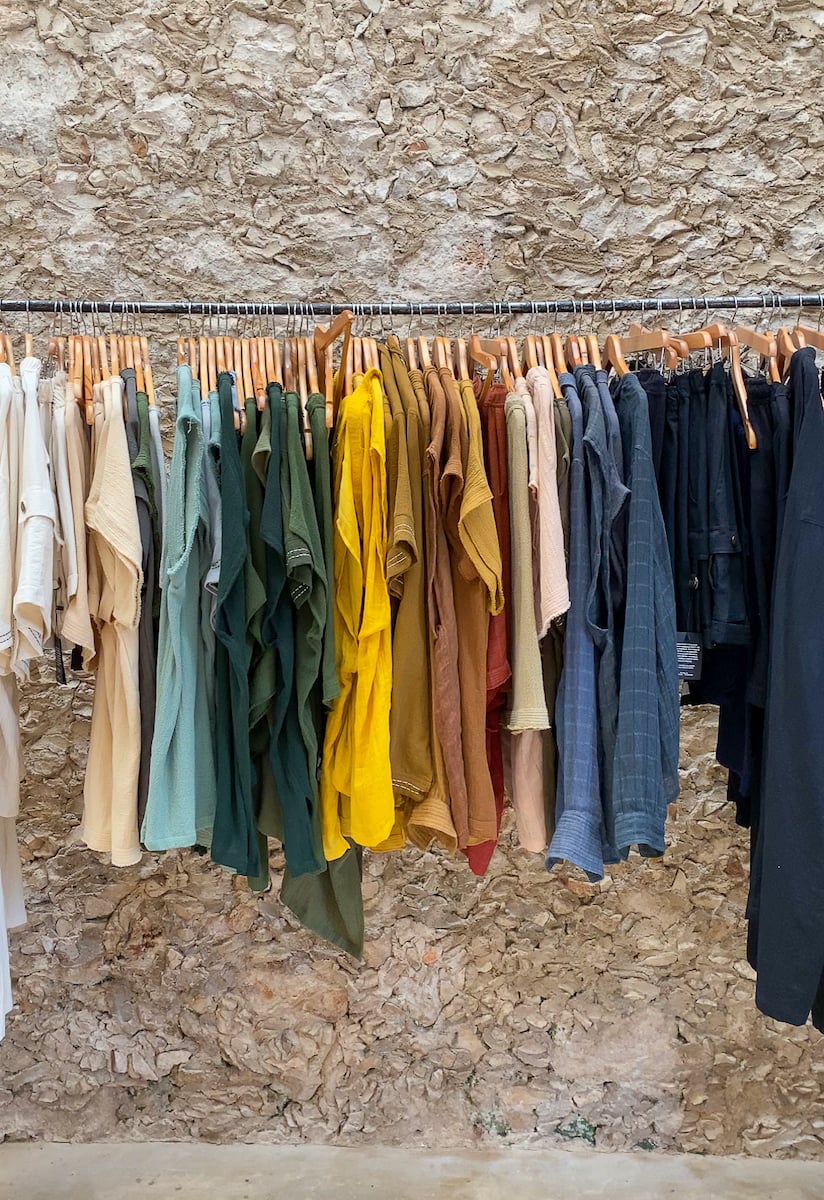 Colorful clothes hanging on a rack