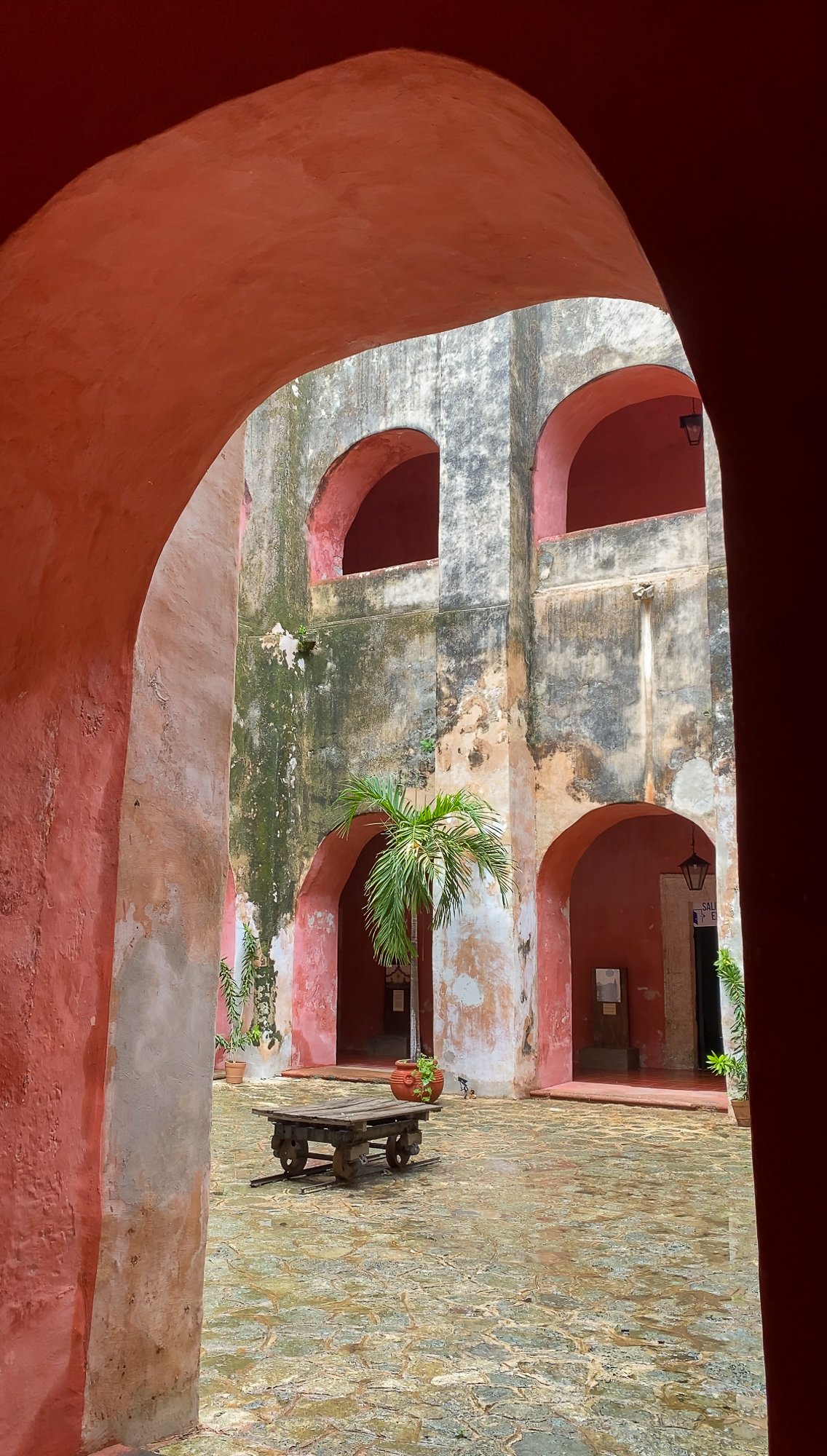 Pink corridors and arches of San Bernardino Convent