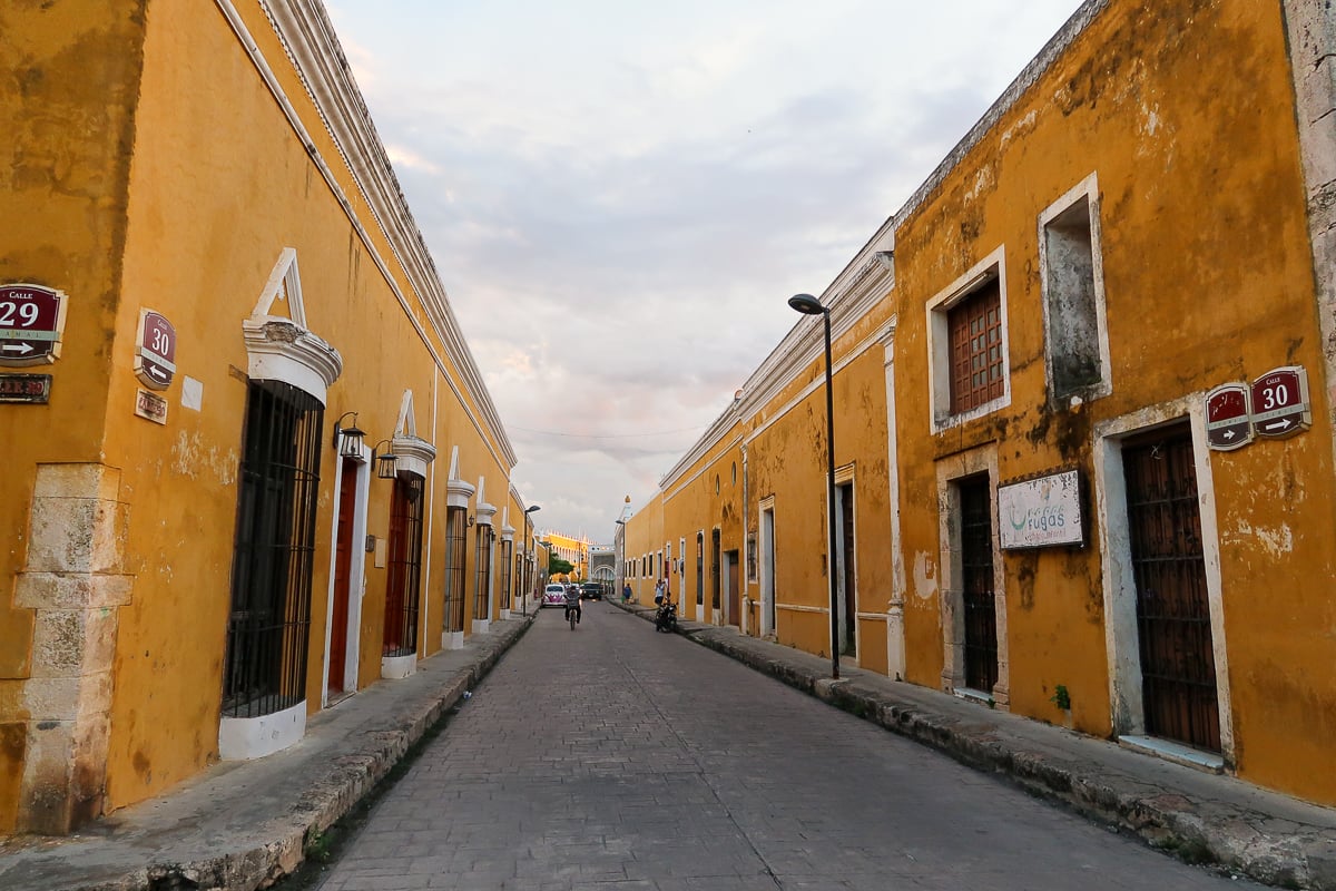 Beautiful yellow street of Izamal. Visiting this "Yellow City" is one of the best things to do in Valladolid.