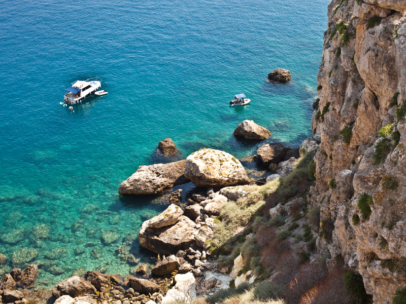 Boats on turquoise waters of Tremiti Islands
