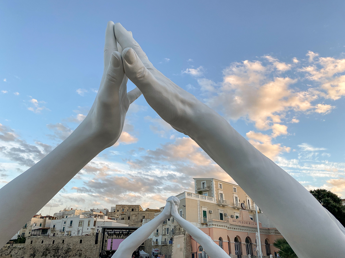 Giant hands sculpture in Vieste, one of the best places to visit in Puglia