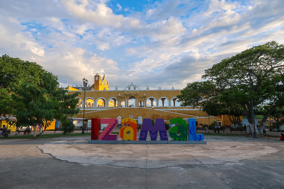 Colorful signage of Izamal in Mexico. Roaming the streets is one of the things to do in Izamal.