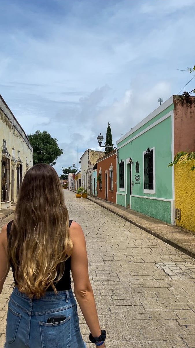 Maddy walking along the quaint, colorful streets of Valladolid