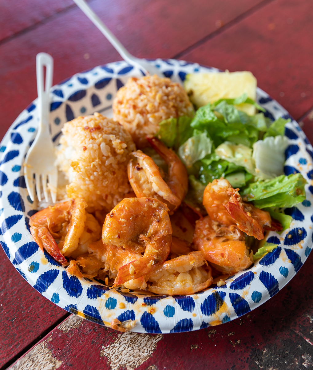 Spicy garlic shrimp plate that comes with rice, pineapple, and lettuce from Jenny's Shrimp Truck in North Shore