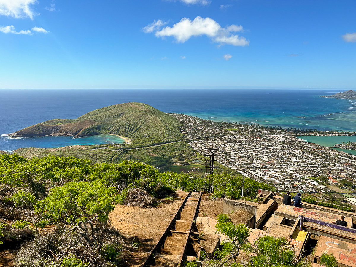 Beautiful view of the city, mountain ridgelines, and the blue ocean from the Koko Head summit