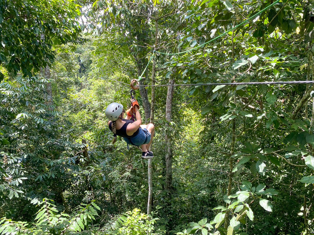 Maddy ziplining through the jungle canopy of Manuel Antonio