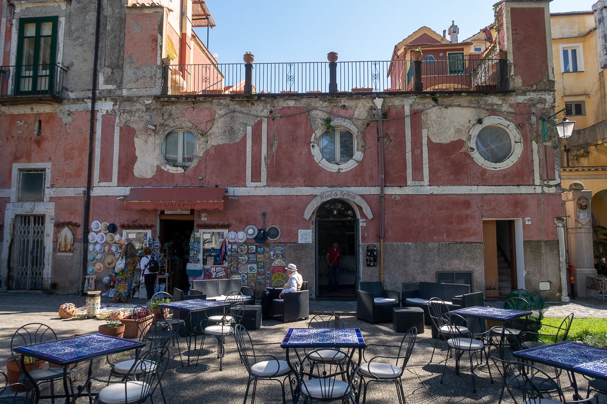 Outdoor dining area and a ceramic souvenirs shop. Your 1 day in Ravello won't be complete if you don't dine here like a royalty.