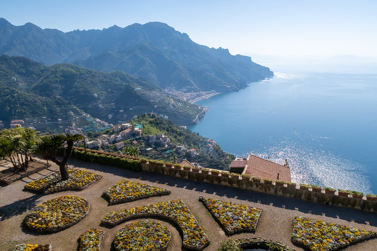 Lush gardens of Villa Rufolo overlooking the Amalfi Coast and surrounding mountains. During your one day in Ravello, make sure to visit this stunning garden and treasure every moment here.