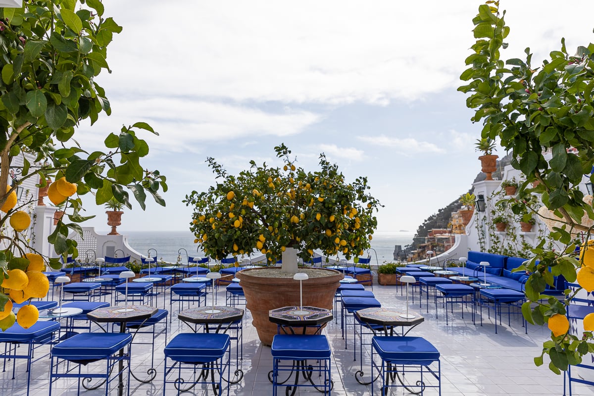 The gorgeous blue and lemon-themed Franco's Bar in Positano - a must-include on your Amalfi Coast itinerary for 7 days.