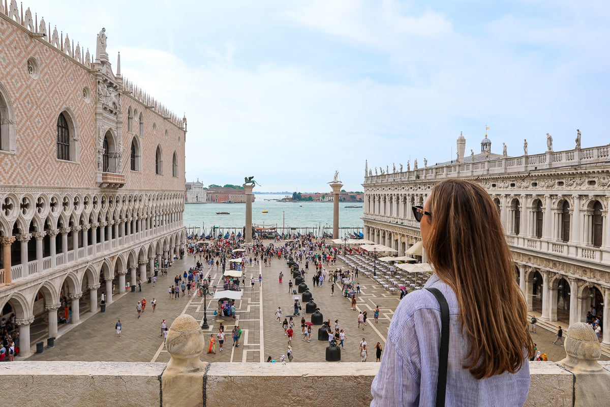 Maddy overlooking Doge's Palace and the Venetian Lagoon from the terrace of St. Mark's Basilica