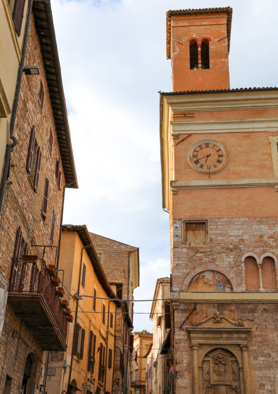 Holding up a glass of wine at a Tuscan vineyard. A day trip around Tuscany is one of the best things to do during your 3 days in Florence.