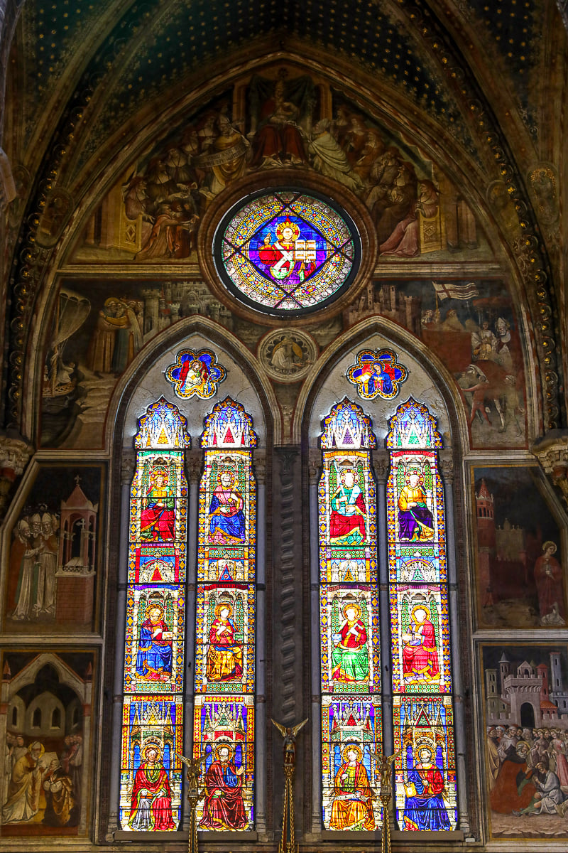 Frescoes and stained glass inside the Basilica di San Petronio