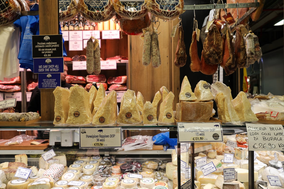 Cheese and ham on display at a stall in Florence's Mercato Centrale